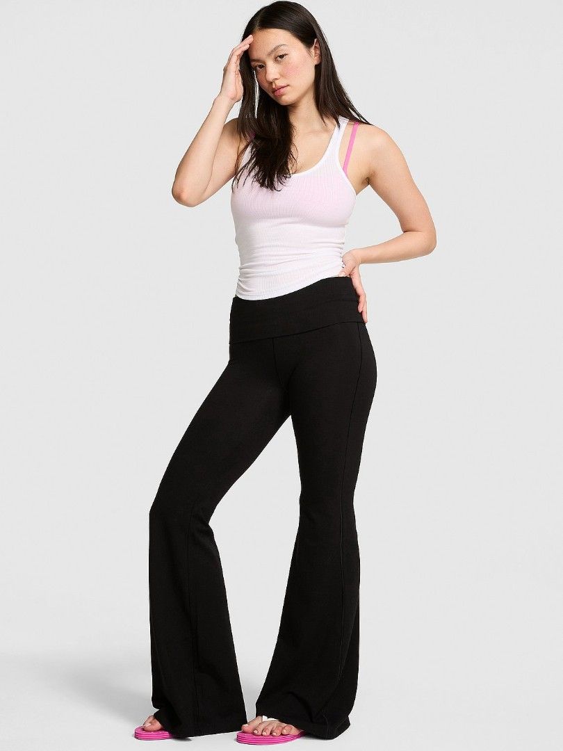 Black Flare Yoga Pants (Category: Activewear) located in Manila. Submitted by endless_thrifts (Listing ID 1439336977, Image 1). Description: - Black flared yoga pants - Wide, comfortable waistband - Made of stretchy material - Full length design - Perfect for yoga and other activities - Solid black color.