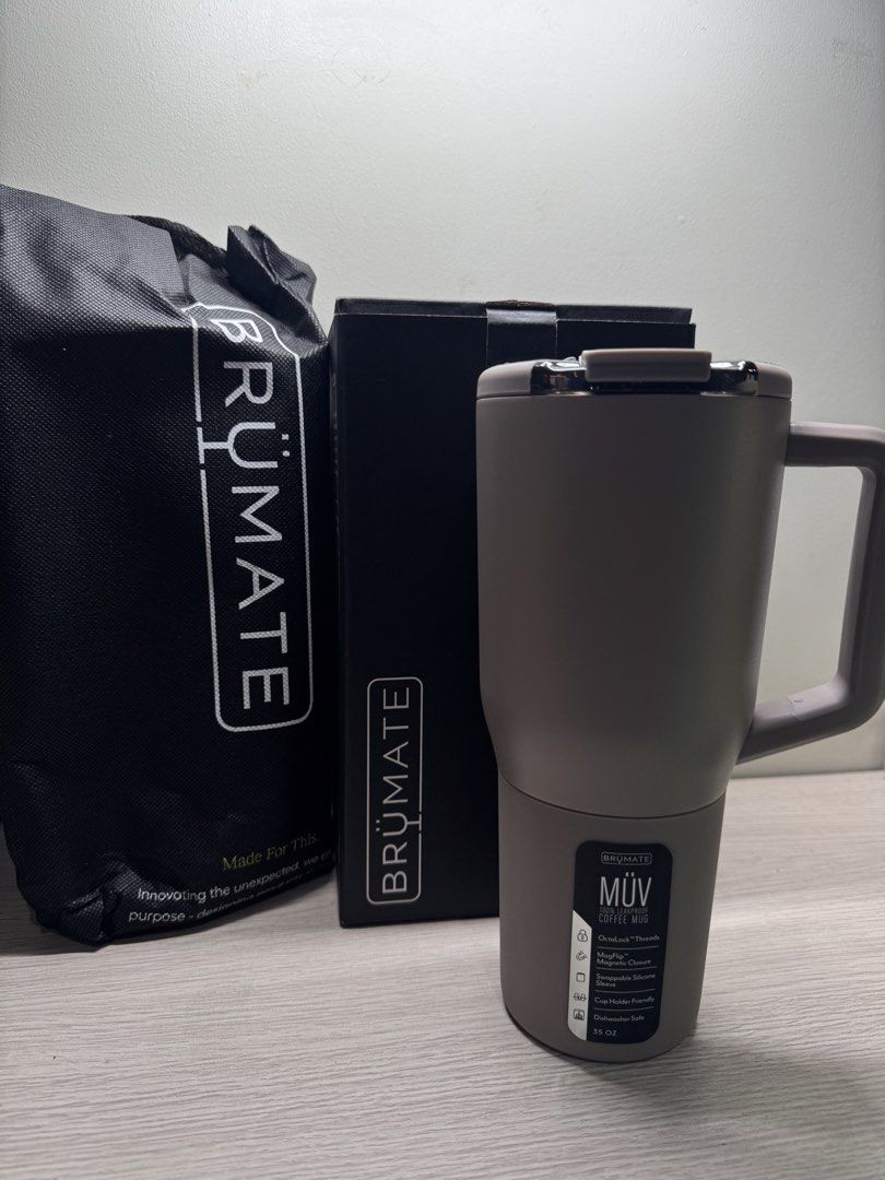 Brumate MUV Tumbler 35oz (Category: Water Bottles & Tumblers) located in Manila. Submitted by tibialisanticus (Listing ID 1439385303, Image 1). Description: Brümate MÜV coffee mug is designed to keep your drinks at the perfect temperature. It features a handle for easy carrying and a secure lid to prevent spills. The mug is dishwasher safe (top rack) and designed in Denver, CO. It comes with its original box and a carrying bag. - in color Mocha -