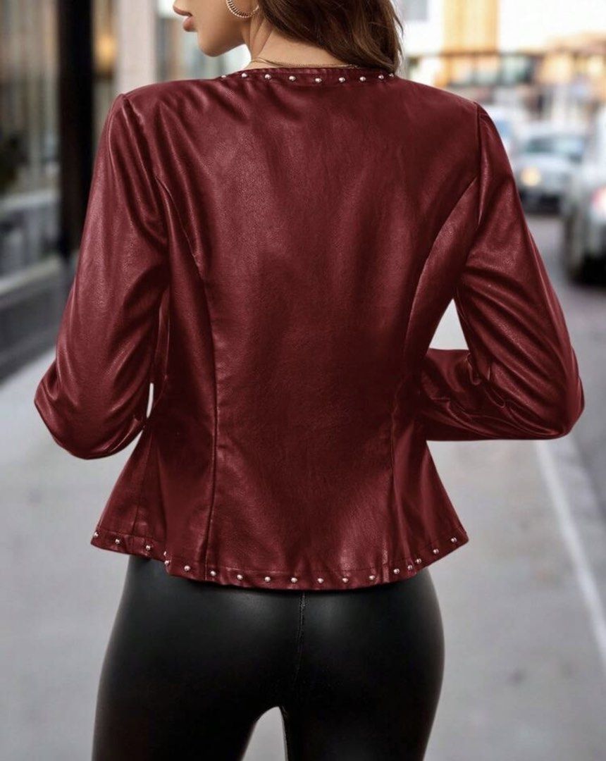 Burgundy Studded Faux Leather Jacket (Category: Coats, Jackets and Outerwear) located in Manila. Submitted by purpleeeshop (Listing ID 1439268875, Image 2). Description: - Burgundy faux leather jacket - Silver stud details - Zip-up front - Round neckline - Long sleeves - Fitted silhouette - Versatile for various occasions.
