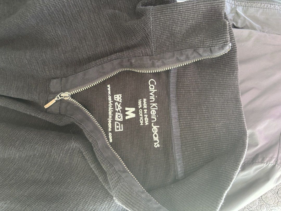 Calvin Klein Jeans Half Zip Black | Good Condition (Category: Coats, Jackets and Outerwear) located in Mandaluyong City. Submitted by mavingumba68239 (Listing ID 1439265578, Image 3). Description: FOR SALE 🔥 Calvin Klein Jeans Half Zip Black ✨ Good Condition 📏 Size: Medium (fits Large) 🎨 Color: Black [No issues / Ready to wear] 💸 ₱399 📍 Pick-up: EDSA Shangri-La Mall and/or Ayala Triangle Makati 🚚 Shipping available (shouldered by buyer) 💳 