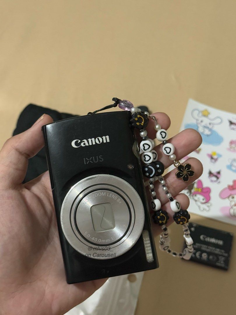 Canon IXUS 185 Digicam (Category: Cameras) located in Manila. Submitted by mlvs03__ (Listing ID 1439209755, Image 2). Description: Read me ‼️ Canon Ixus 185 in Black 🎱 Crowd’s fave 🤩 100% fully functional: flash, zoom, video, audio, and all buttons are working! Specs: ✦ 20 mp - ccd sensor ✦ 8x optical zoom (28-224mm) ✦ digic 4+ processor ✦ body condition: 8/10 (signs of usage & no port cover) Honest issue/s: -minimal scratch on lens glass (tole