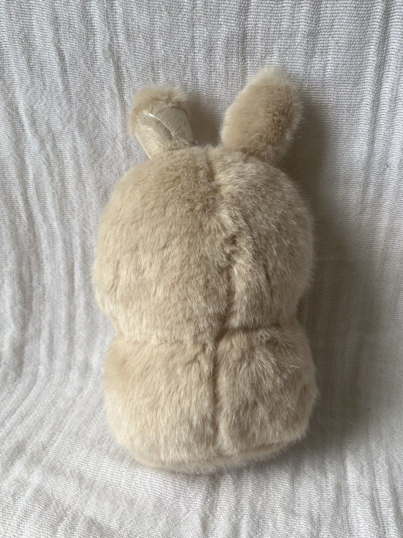 Capybara Bunny Carrot Plush Toy (Category: Plushies & Soft Toys) located in Manila. Submitted by prima_onda (Listing ID 1439294842, Image 2). Description: - Adorable bunny plush toy - Soft and fluffy exterior - Features a cute face and carrot detail - Light brown color - Includes a hood, small arms, and legs - Perfect for cuddling or decoration.