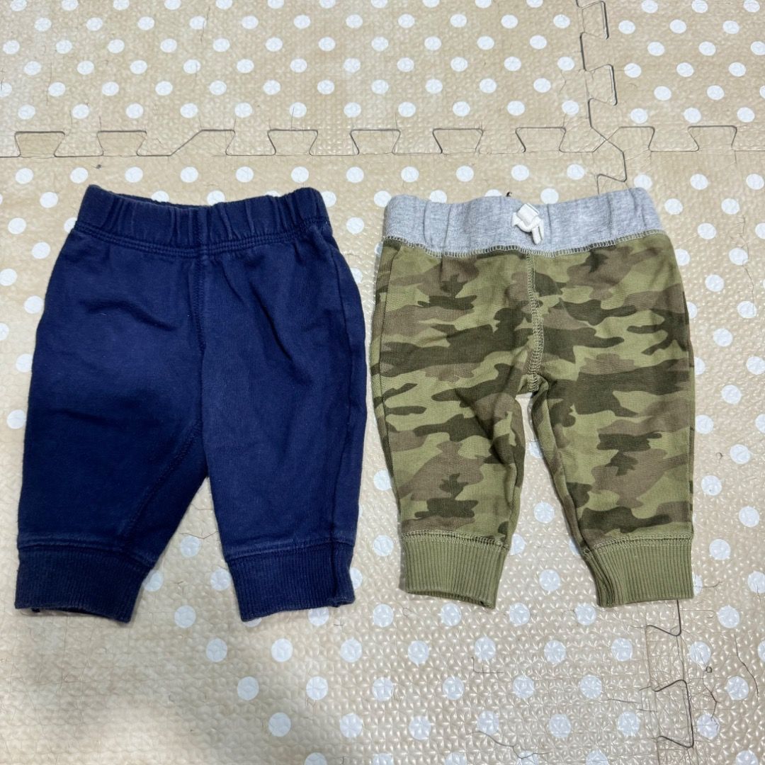 Carter's Baby Pants - 2 Pieces (Category: Babies & Kids Fashion) located in Manila. Submitted by louvemaria (Listing ID 1439297040, Image 1). Description: - Good as new - Set of two Carter's baby pants - Includes: - Navy blue pants (3 months) - Camouflage pants (newborn) - Features: - Elastic waistbands - Cuffs at the ankles - Made of soft, comfortable material.