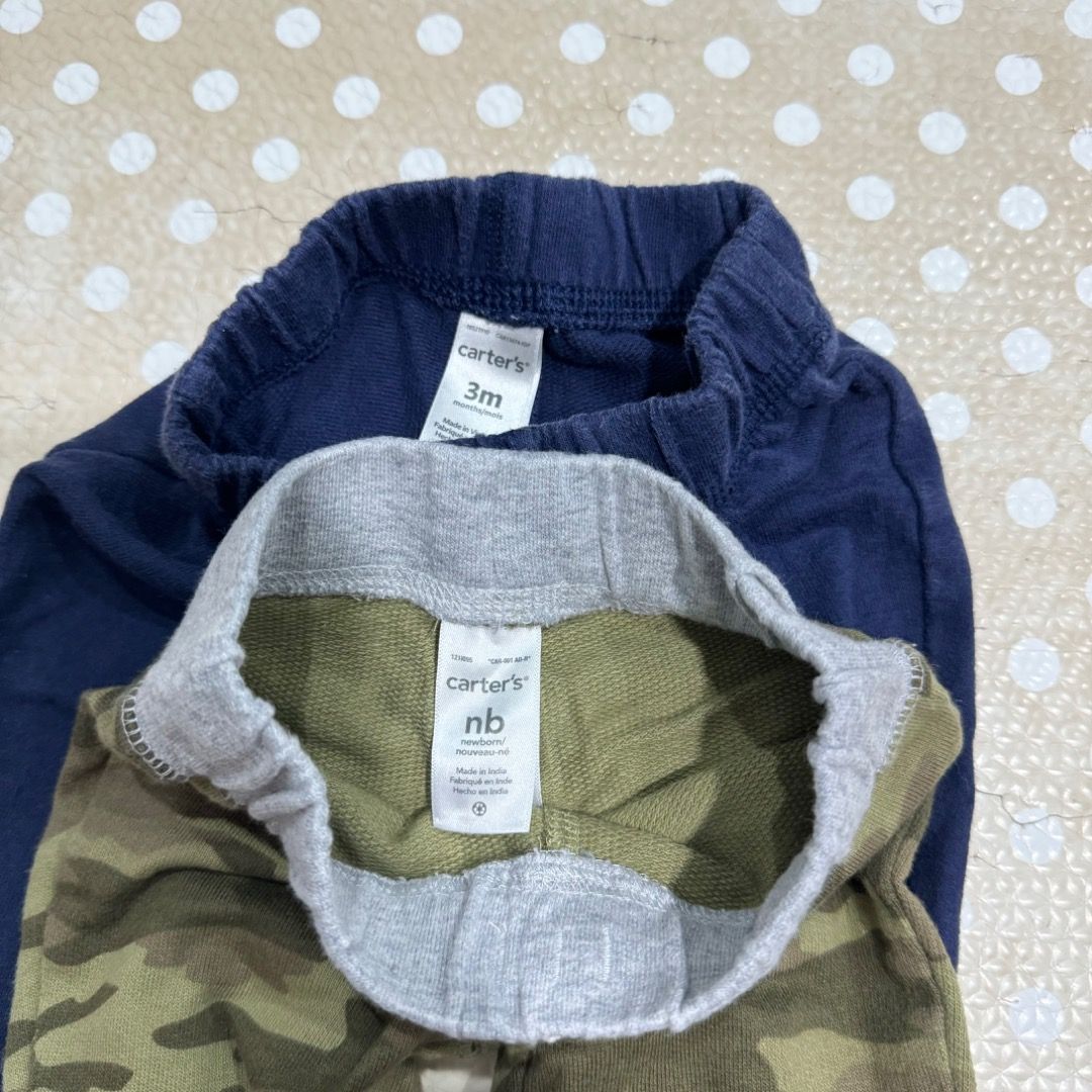 Carter's Baby Pants - 2 Pieces (Category: Babies & Kids Fashion) located in Manila. Submitted by louvemaria (Listing ID 1439297040, Image 2). Description: - Good as new - Set of two Carter's baby pants - Includes: - Navy blue pants (3 months) - Camouflage pants (newborn) - Features: - Elastic waistbands - Cuffs at the ankles - Made of soft, comfortable material.