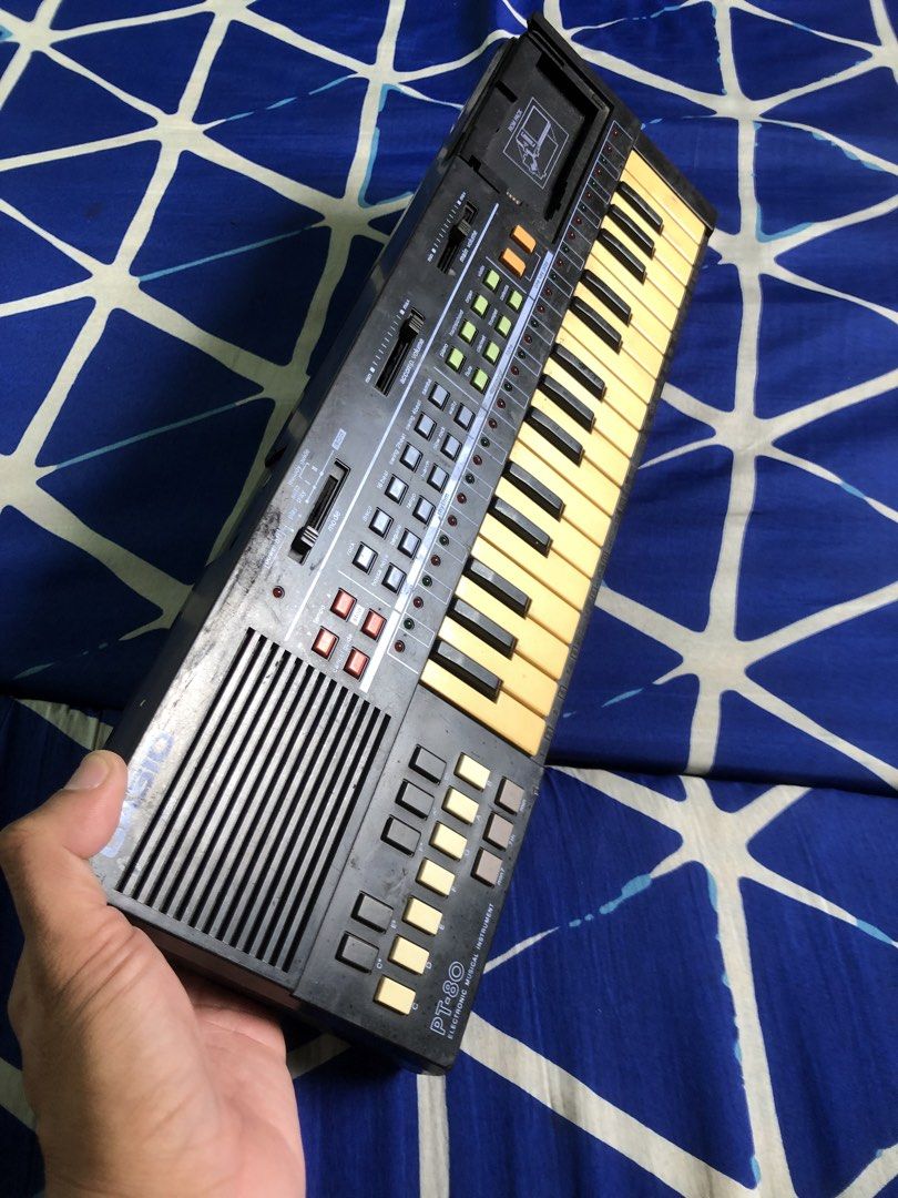 Casio PT-80 digital keyboard (Category: Musical Instruments) located in Quezon City. Submitted by markgolveo (Listing ID 1439268946, Image 2). Description: Casio PT-80 digital keyboard Tested over batteries working all functionalities , buttons and keys Good sound output Issues as shown on images Signs of wears Crack on top right corner does not affect on functions Missing tape rom pack cover.