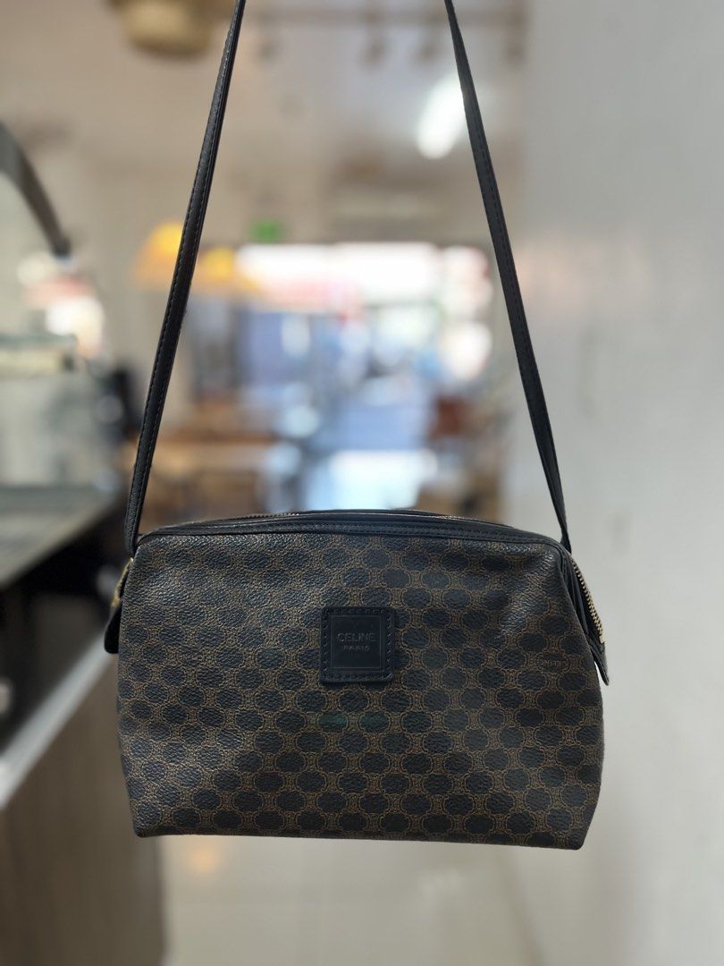 Celine Macadam Pattern Crossbody Bag (Category: Luxury Bags & Wallets) located in Manila. Submitted by Lenlen23 (Listing ID 1439343492, Image 1). Description: - Celine Crossbody Bag - Iconic Macadam pattern - Rectangular shape - Zip closure - Black leather strap - Celine Paris logo patch - Brown and black pattern - Classic design.