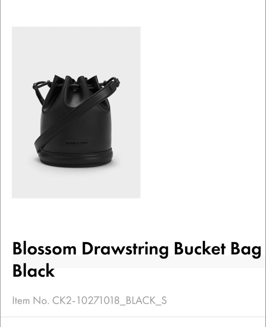 Charles & Keith Blossom Drawstring Bucket Bag - Black (Category: Cross-body Bags) located in Paranaque City. Submitted by macadamia31 (Listing ID 1439292343, Image 3). Description: - Charles & Keith Blossom Drawstring Bucket Bag - Color: Black - Features: - Drawstring closure - Detachable shoulder strap - Embossed Charles & Keith logo - Includes original tag - Item number: CK2-10271018_BLACK_S.