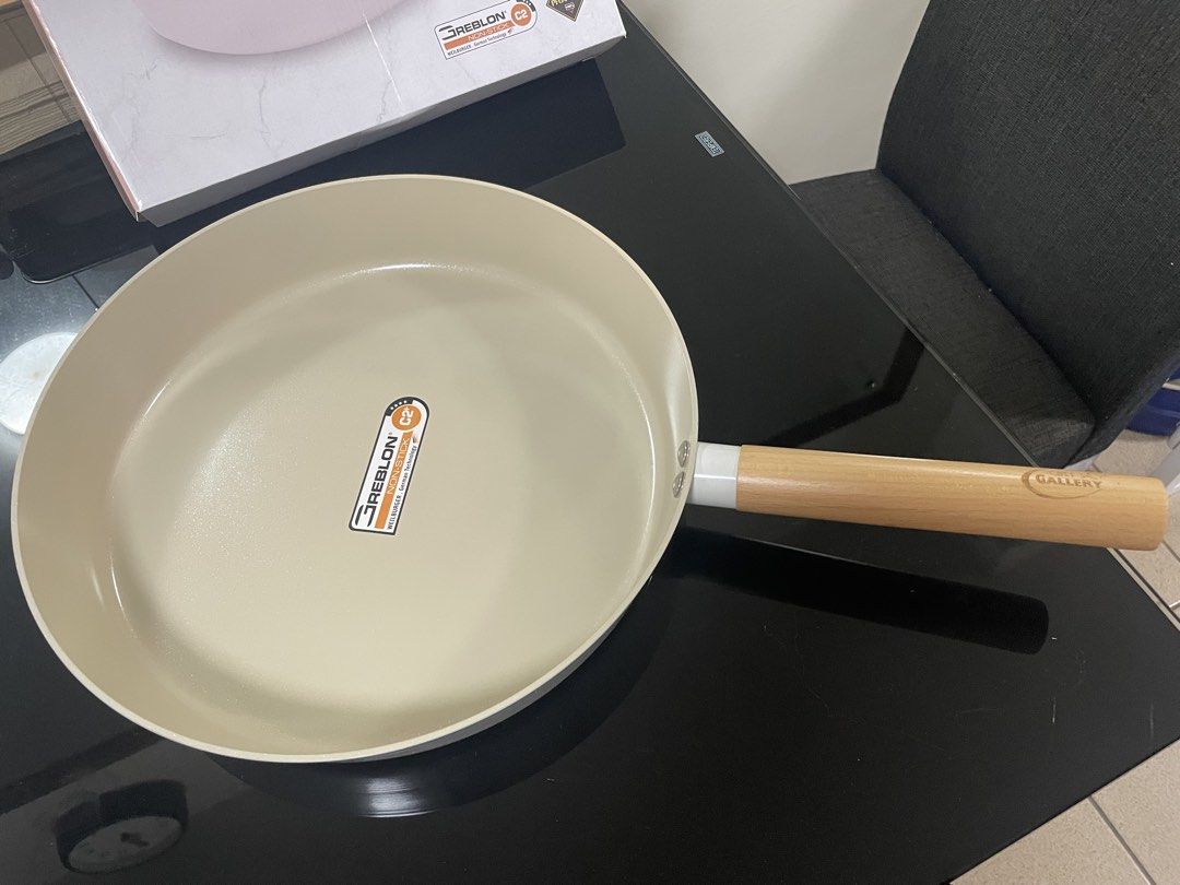 Chef's Gallery Zita Frying Pan (Category: Cookware & Accessories) located in Antipolo. Submitted by MarieAnneYu (Listing ID 1439400285, Image 2). Description: - Chef's Gallery Zita frying pan - 30 cm x 6 cm - Non-stick surface (German technology) - Light beige interior - Wooden handle - Includes original box - Brand new : original price ₱1,429.-.