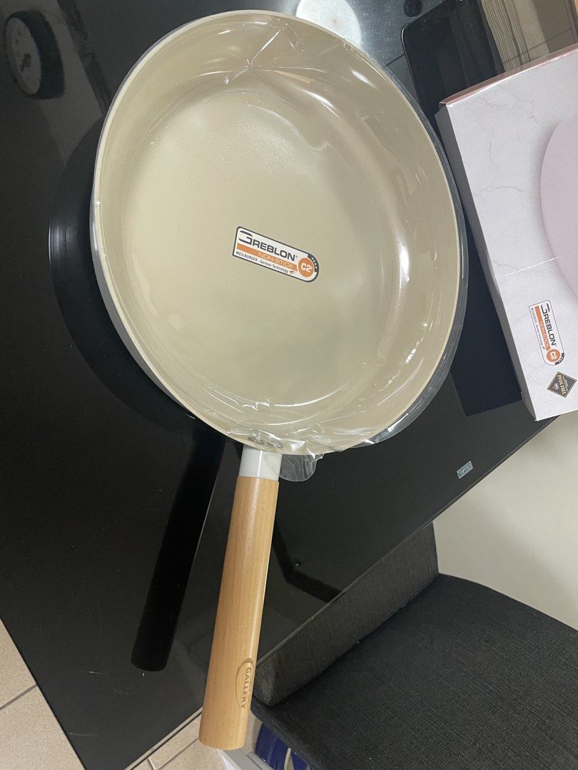 Chef's Gallery Zita Frying Pan (Category: Cookware & Accessories) located in Antipolo. Submitted by MarieAnneYu (Listing ID 1439400285, Image 1). Description: - Chef's Gallery Zita frying pan - 30 cm x 6 cm - Non-stick surface (German technology) - Light beige interior - Wooden handle - Includes original box - Brand new : original price ₱1,429.-.
