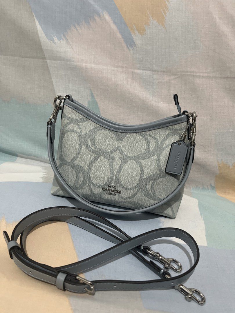 Coach Mini Laurel (Category: Luxury Bags & Wallets) located in Las Pinas. Submitted by erenrosc (Listing ID 1439373613, Image 2). Description: - Coach shoulder/sling bag - Features signature pattern - Detachable strap included - Light blue interior lining - Small interior pocket - Silver-tone hardware - Comes with Coach tag - Suitable for everyday or special use.
