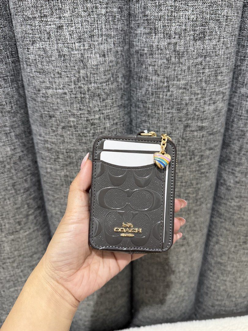 Coach zip card case "New arrival" (Category: Luxury Bags & Wallets) located in Las Pinas. Submitted by yhn_boutique (Listing ID 1439396943, Image 2). Description: Actual pic posted Lalamove ready Complete inc. Dm 💌.