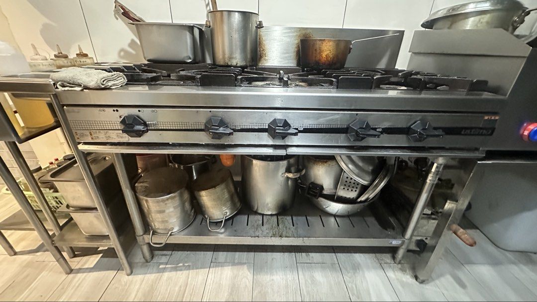 Commercial Gas Range Stove (Category: Other Kitchen Appliances) located in Manila. Submitted by pr777lala (Listing ID 1439403012, Image 1). Description: - Commercial gas range stove - Stainless steel exterior - Multiple burners for efficient cooking - Lower shelf for storage - Ideal for restaurant or commercial kitchens - Sturdy build and well-maintained - Negotiable - Tarlac-based - Got it from Japan Surplus - Pick-up preferred .