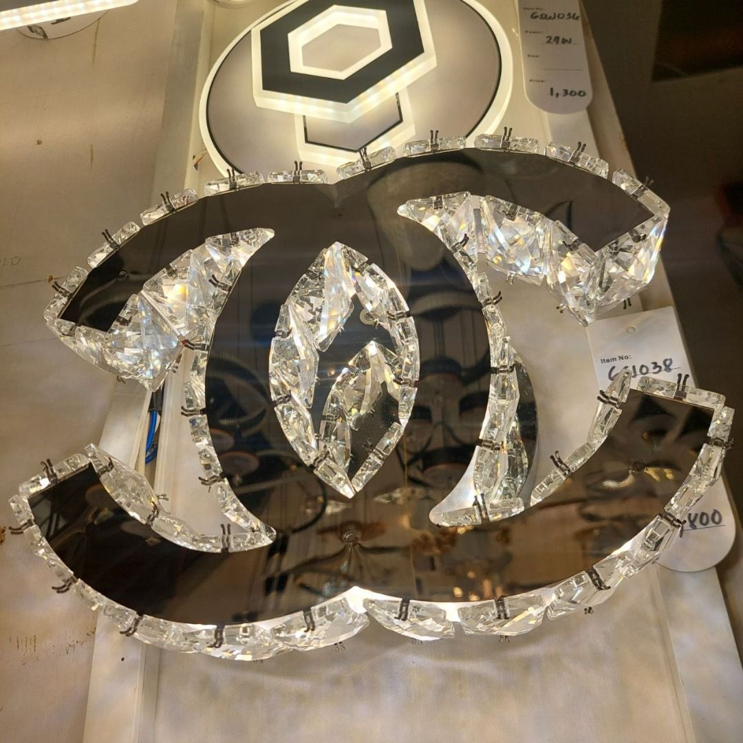 Crystal wall Light (Category: Lighting) located in Caloocan City. Submitted by cosmicowl.004478 (Listing ID 1439333664, Image 1). Description: - Elegant crystal chandelier - Unique design with sparkling crystals - Provides bright and stylish illumination - Perfect for adding luxury to any room - Mirrored base - Price: ₱1,500.