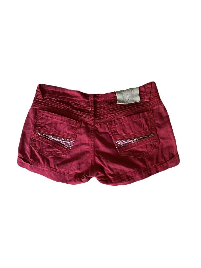 Cute red low waisted shorts y2k (Category: Shorts) located in Manila. Submitted by pookstyle (Listing ID 1439377743, Image 2). Description: Minor stains as listed in the picture. Waist - 28in Length - 9in.