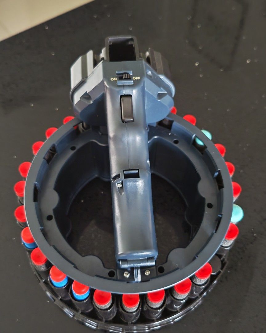 D-Dart Rotating Dart Blaster not nerf (Category: Toys & Games) located in Singapore. Submitted by judahazariah (Listing ID 1439326817, Image 2). Description: - Small sized automatic blaster. - Features an on/off switch. - Comfortable grip for easy handling. - Perfect for fun and games! - Bullets included! - Automatic firing. #not #nerf.