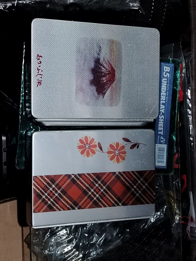 Decorative Tin Boxes (Category: Storage Boxes & Baskets) located in Quezon City. Submitted by 09277011179 (Listing ID 1439375021, Image 1). Description: - Set of two decorative tin boxes - Designs: Floral with plaid, Japanese style - Color: Silver - Intended use: Storage or display pm for faster transaction buyer shoulders shipping fee.