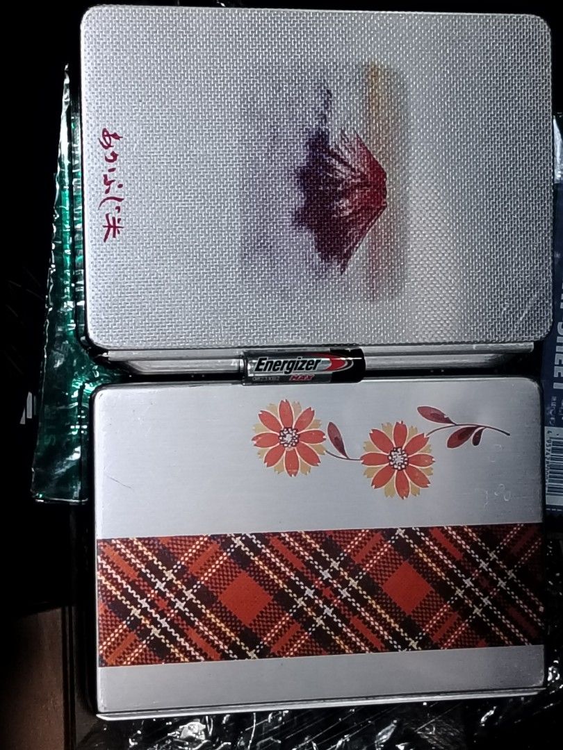 Decorative Tin Boxes (Category: Storage Boxes & Baskets) located in Quezon City. Submitted by 09277011179 (Listing ID 1439375021, Image 2). Description: - Set of two decorative tin boxes - Designs: Floral with plaid, Japanese style - Color: Silver - Intended use: Storage or display pm for faster transaction buyer shoulders shipping fee.