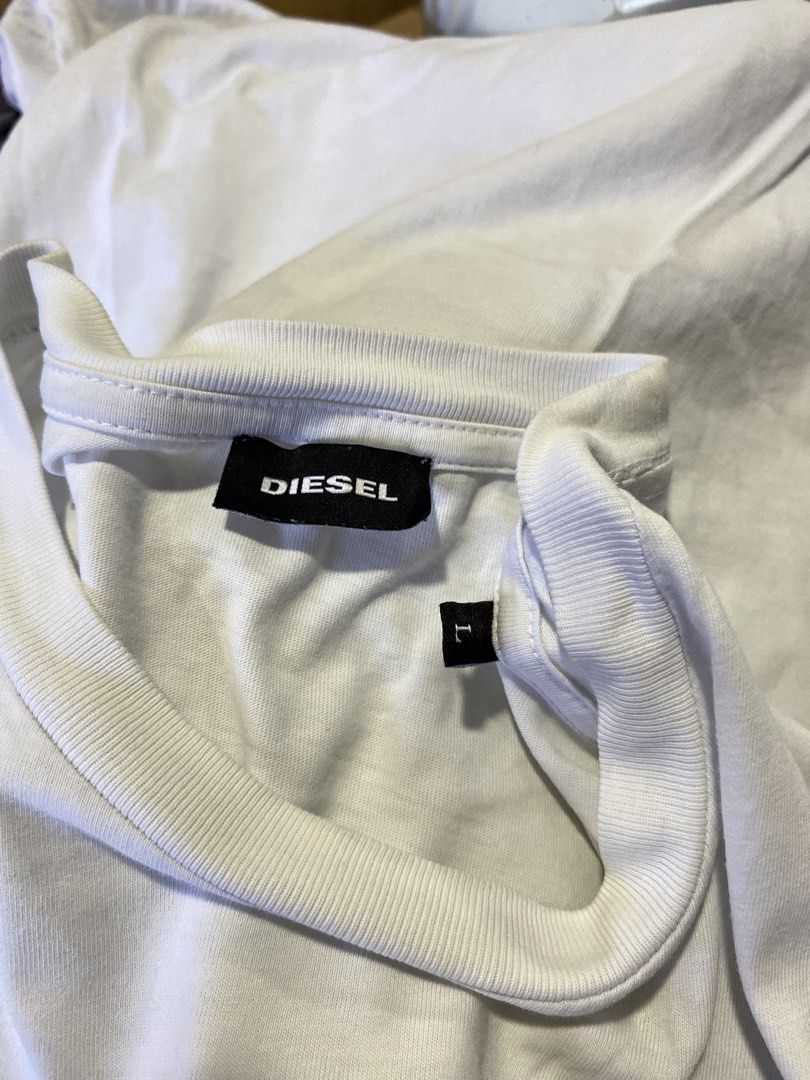 Diesel white (Category: Tshirts & Polo Shirts ) located in San Fernando. Submitted by jyyyshytt (Listing ID 1439355499, Image 3). Description: excellent condition No issue Color rate:9.5/10 Dimensions:W22 L28 *actual color may vary slightly due to lighting and screen settings..