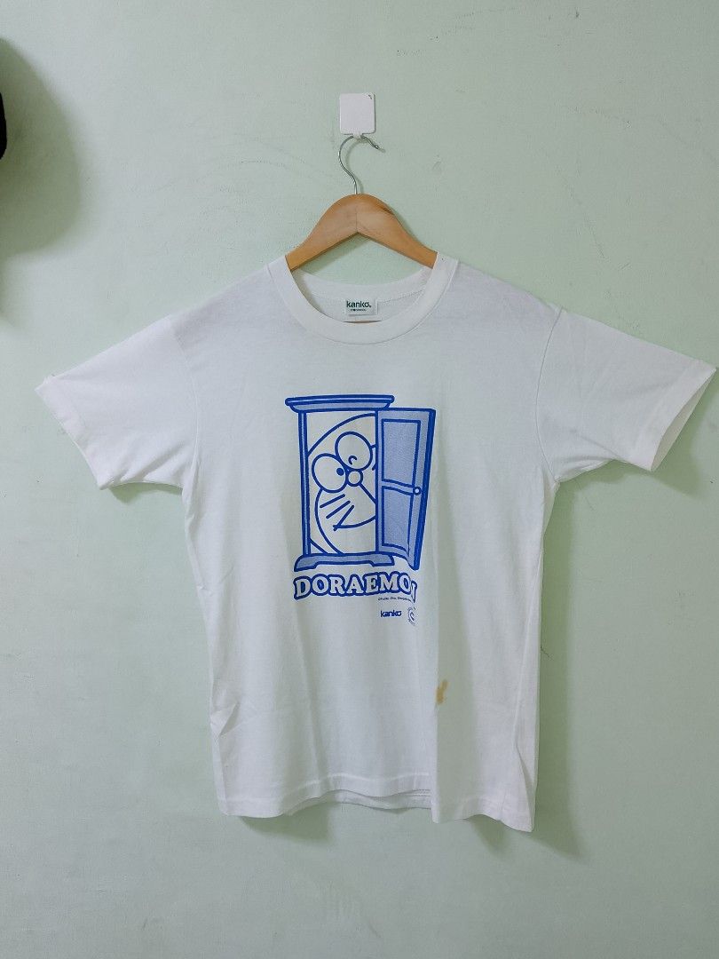 Doraemon Kanko Eco School T-shirt (Category: Tshirts & Polo Shirts ) located in Manila. Submitted by onewikstraight (Listing ID 1439274283, Image 2). Description: - Brand: Kanko Eco School - Design: Doraemon graphic vintage - Singlestich all the way - Size med to large - Color: White - Neckline: Round neck - Condition: Has a small stain on the front. PM Cavite location 1500+sf.