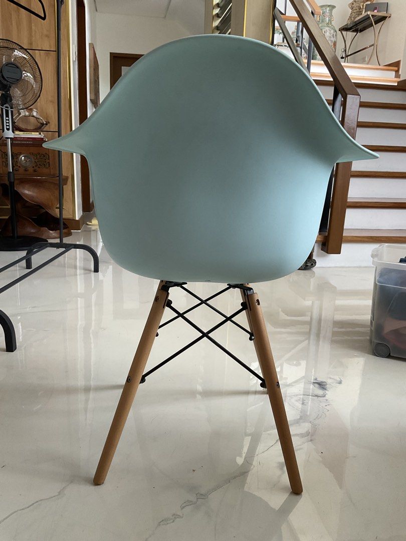 Eames Style Armchair - Mint Green (Category: Chairs) located in Antipolo. Submitted by ibyangs_closet (Listing ID 1439271476, Image 2). Description: - Stylish armchair - Mint green seat - Wooden legs with black metal supports - Comfortable curved backrest and armrests - Modern design - Sturdy construction - Flaw: has a squeaking sound.