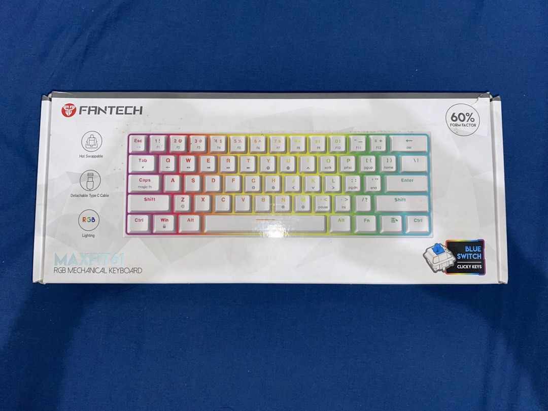 Fantech Maxfit61 60% Wired RGB Mechanical Keyboard (Blue Switch) (Category: Computer Keyboard) located in Makati City. Submitted by 3lcid (Listing ID 1439376244, Image 1). Description: - Brand new, never been used (Opened just to check everything) - All complete - Box condition: 8/10 - RFS: Need funds to buy new mouse Meetups: - SM Megamall, Rockwell Mall Makati Shipping: - Can do Lalamove (buyer pays and books shipping).