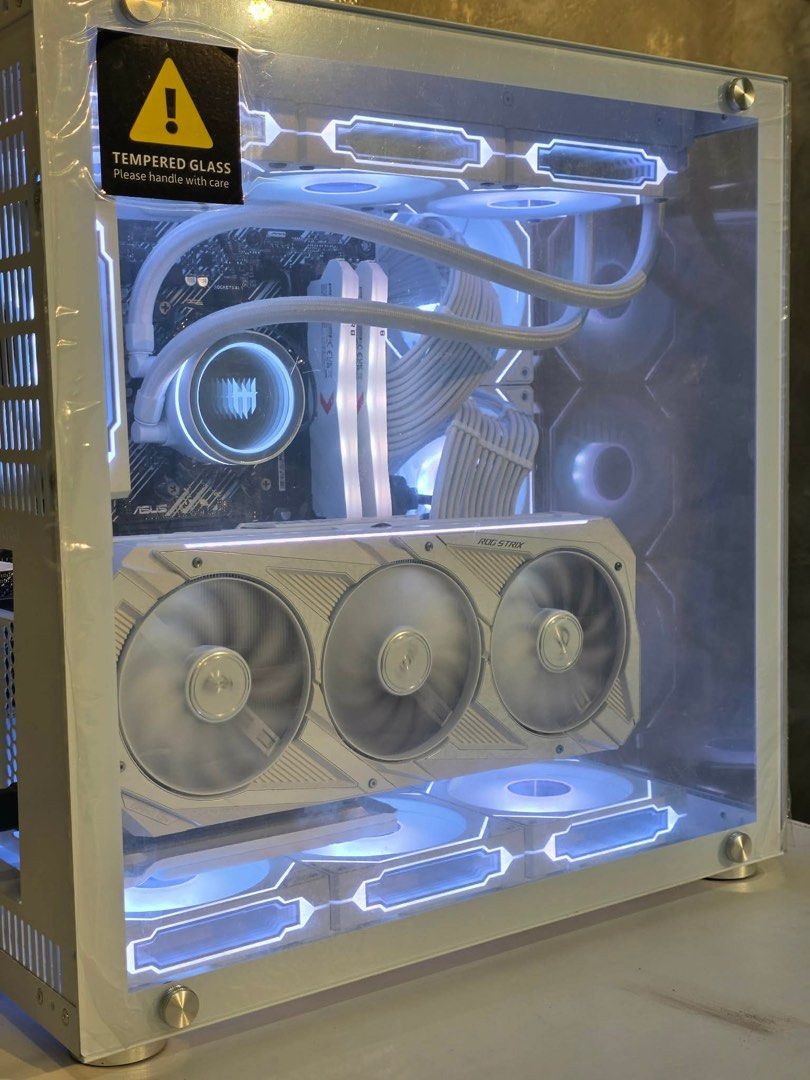 GAMING PC SET W/ TABLE & CHAIR (Category: Desktops) located in Manila. Submitted by manabatsu (Listing ID 1439276065, Image 2). Description: Rog strix white PC Processor: AMD RYZEN 7 5800X 8-Core 16t GPU: Asus Rog strix white RTX 3080 10GB Motherboard: Asus b550 prime wifi ii Memory: 16GB 3600mhz PNY White NVME: 2TB Kingston fury Renegade HDD: 1TB WD Blue 7200RPM PSU: FSP Hydro Pro 850w 80+ Bronze Liquid Cooler: Tecware Mirage 360mm AIO Gpu Mount
