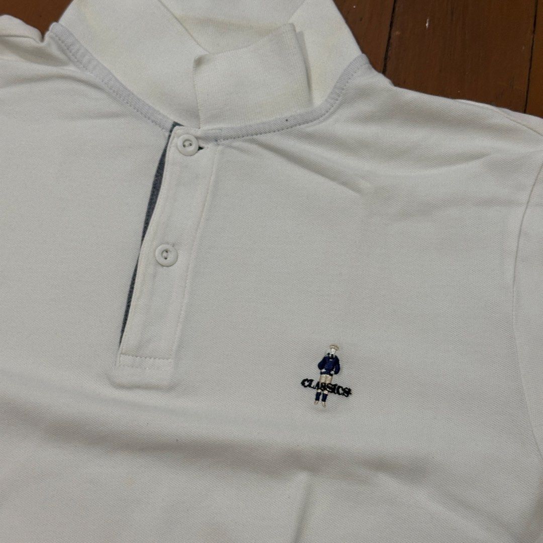 Giordano Polo Shirt - Size M (Category: Tshirts & Polo Shirts ) located in Pasig City. Submitted by rekdi (Listing ID 1439409149, Image 2). Description: Original Giordano polo with clean minimalist design and embroidered detail. Still in good condition with minimal signs of use. Has very small stains that are barely noticeable when worn. Dimensions: - Length = 26 inches - Width = 19.5 inches RFS: Decluttering DM me if interested.