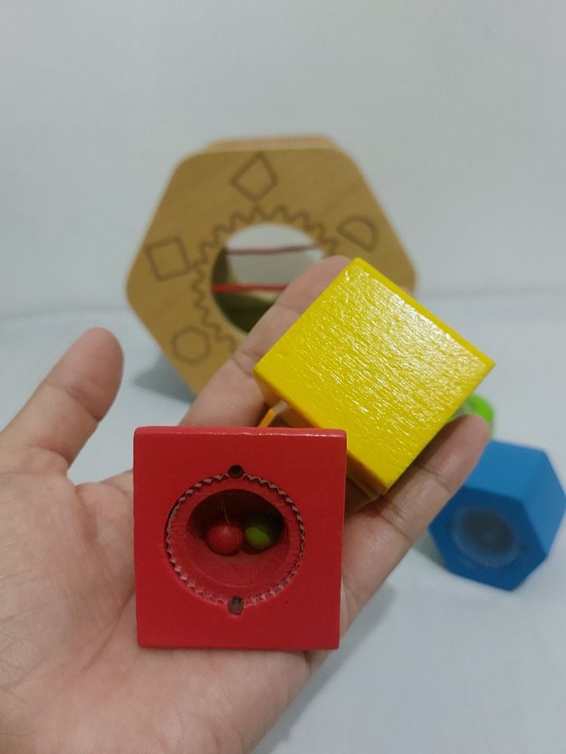 Hape Shake and Match Shape Sorter (Category: Educational & Learning Toys) located in Paranaque City. Submitted by ca.firstonlinebiz (Listing ID 1439297634, Image 3). Description: Preloved Hape Shake and Match Shape Sorter -complete Bead-filled blocks -minimal sign of usage Loc. Greenheights Parañaque Open for shipping lalamove or Spx express Gcash, Maya, BPI payment.