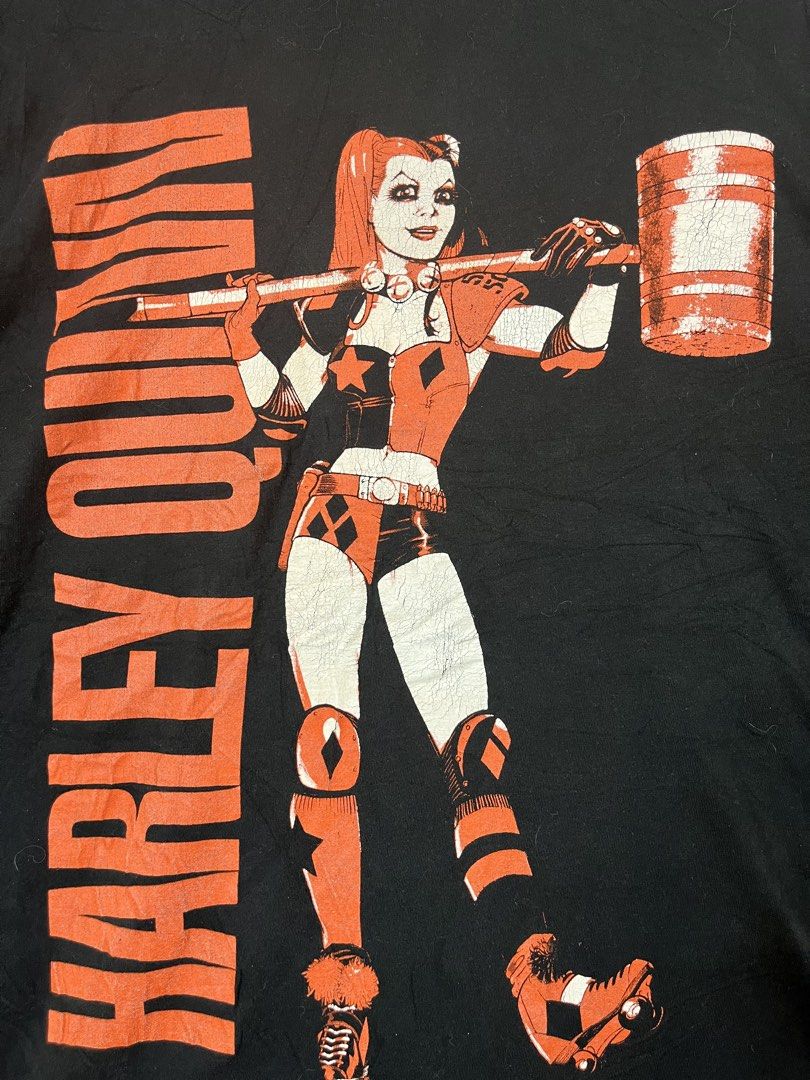 Harley Quinn Graphic Tee - Size L (Category: Shirts) located in Baguio. Submitted by cosmicgem_21b525 (Listing ID 1439268578, Image 2). Description: - Black Harley Quinn graphic tee - Size: Large - Features a large Harley Quinn print - Harley Quinn logo on the back - Material: Cotton - Machine washable.