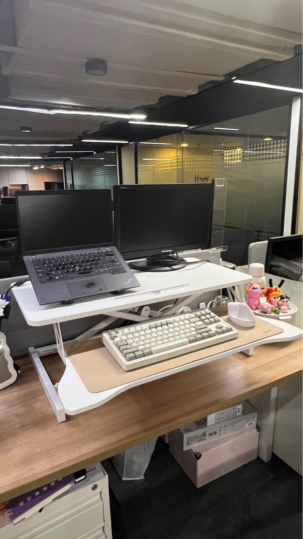 Height-adjustable Standing Desk Converter with Keyboard Tray (Category: Monitor Screens) located in Pasig City. Submitted by sml08 (Listing ID 1439380294, Image 1). Description: Bought it at ₱3,000 Laptop, monitor, keyboard, mouse not included.