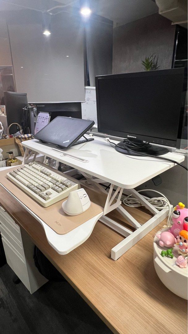 Height-adjustable Standing Desk Converter with Keyboard Tray (Category: Monitor Screens) located in Pasig City. Submitted by sml08 (Listing ID 1439380294, Image 2). Description: Bought it at ₱3,000 Laptop, monitor, keyboard, mouse not included.