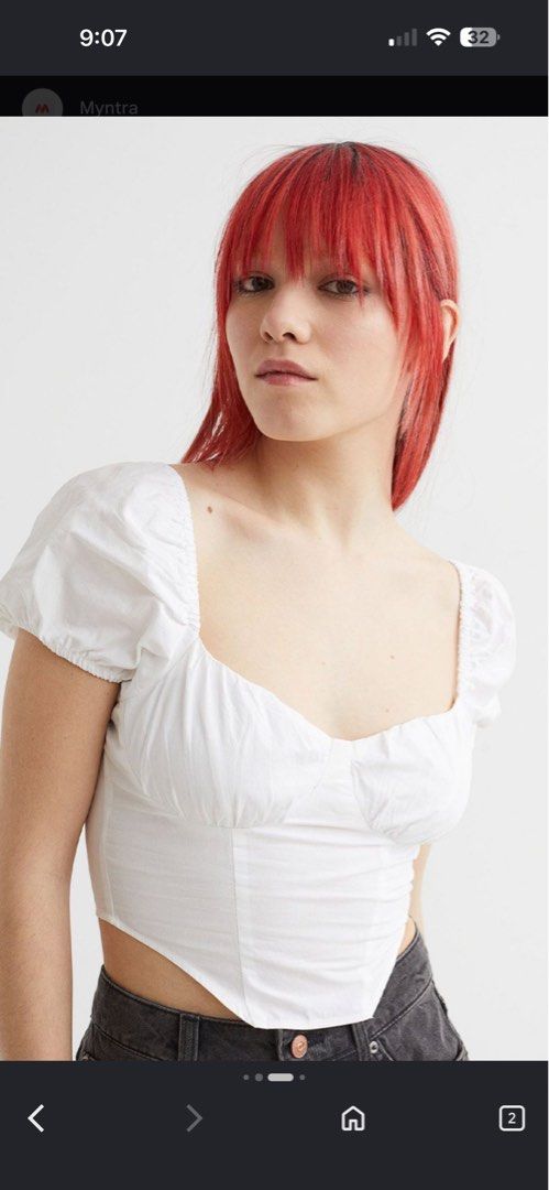 H&M White Puff Sleeve Crop Top (Category: Blouses) located in Bustos. Submitted by krjavier (Listing ID 1439256132, Image 1). Description: White crop top from H&M with puff sleeves. Features a square neckline and a fitted bodice. The back has shirring detail. The top has a unique asymmetrical hemline. Perfect for pairing with high-waisted bottoms. Made of a lightweight fabric. Can fit up to medium/semi-large.