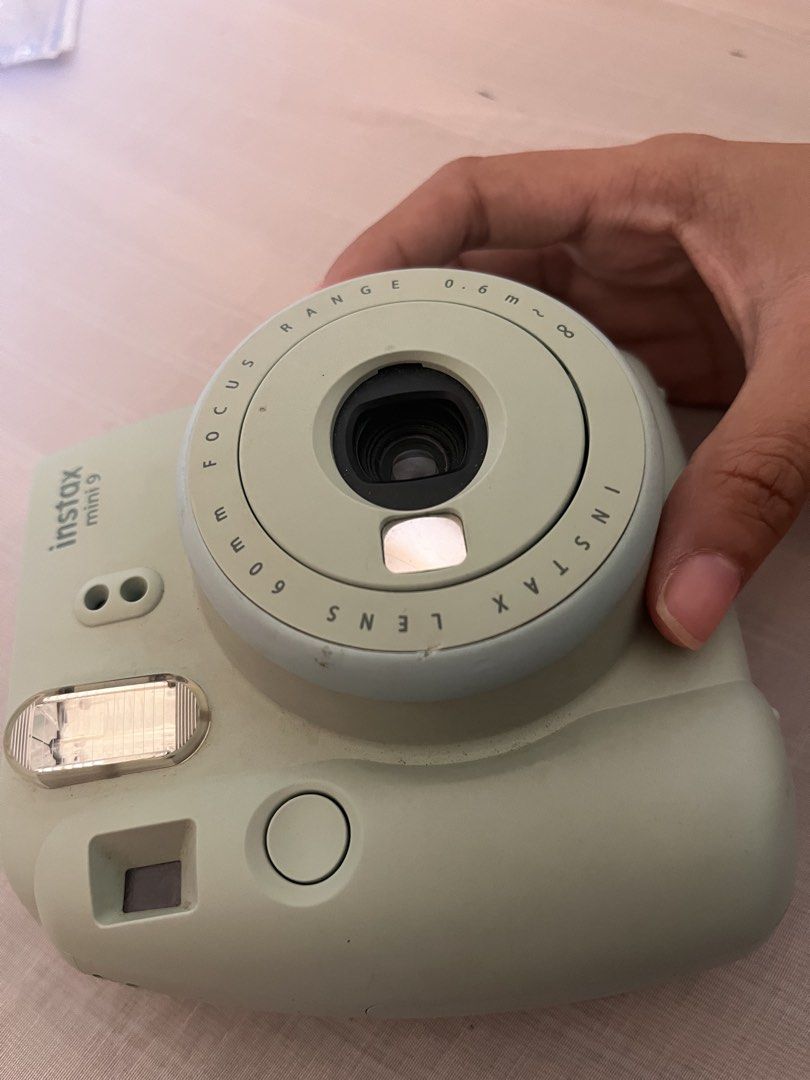 Instax Mini 9 FUJIFILM Camera Rush Sale (Category: Cameras) located in Cavite. Submitted by lovmefvre (Listing ID 1439270606, Image 3). Description: 📸 Instax Mini 9 For Sale RFS: Need funds, hindi na rin nagagamit. No to lowballers Honest issue: • May slight dent sa camera part • Hindi nagc-close fully yung lens cover ng Instax • Still working with battery • Camera body has oxidized na so mas mint green na siya kaysa mint blue 📦 Lalamove / Grab