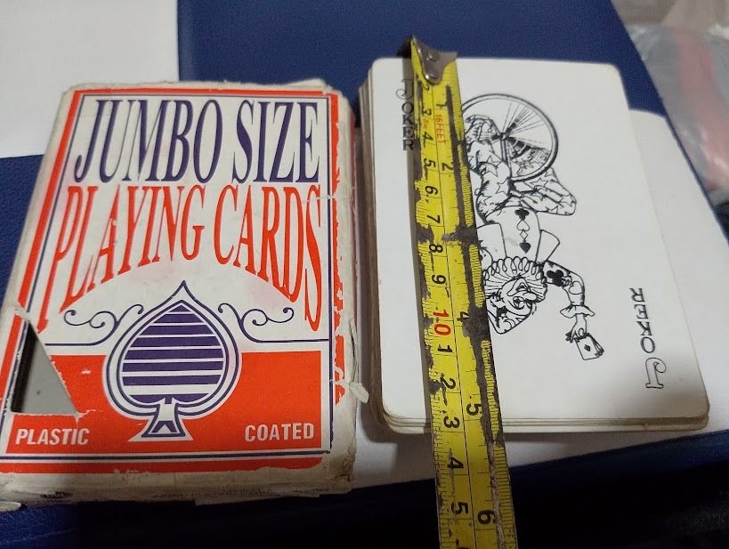Jumbo Size Playing Cards (Category: Toys & Games) located in Quezon City. Submitted by susmaryosep1 (Listing ID 1439370747, Image 1). Description: - Jumbo-sized playing cards - Plastic-coated for enhanced durability - Features a joker card - Standard deck size - Spade design on the box.