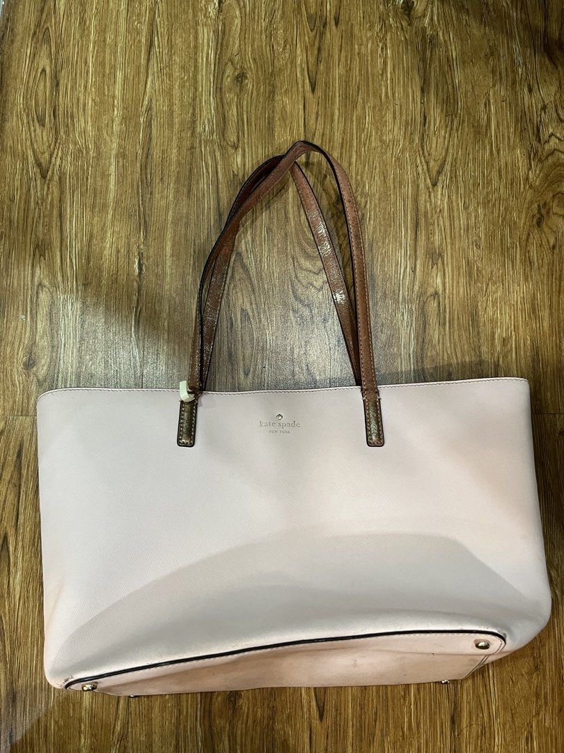 Kate Spade Saffiano Leather Totebag (Category: Tote Bags) located in Manila. Submitted by reeeyreeeyreeey (Listing ID 1439376429, Image 1). Description: - Kate Spade Saffiano Leather Totebag - Light pink color - Made with durable Saffiano leather - Spacious interior - Classic design - Handles show some wear, need replacement or repair.