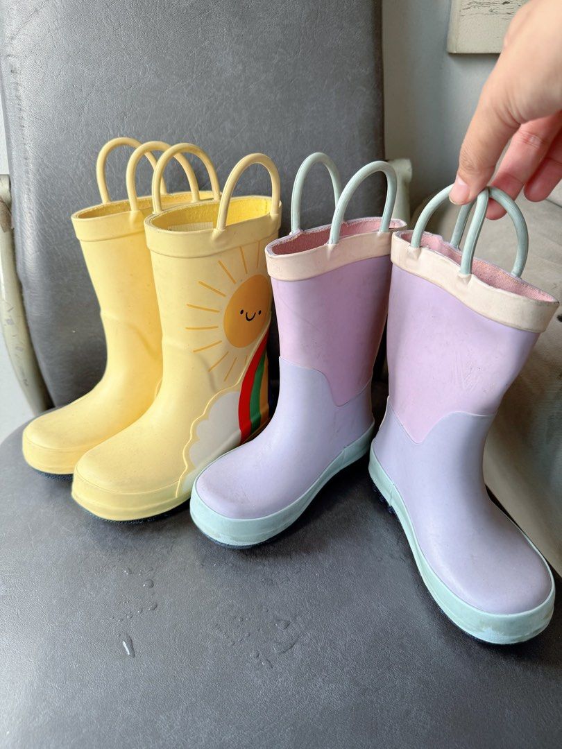 Kids' Rain Boots with Handles (Category: Babies & Kids Fashion) located in Manila. Submitted by pinkgirl858 (Listing ID 1439312478, Image 1). Description: - Colorful rain boots for kids - Available in yellow and lavender - One pair features a cute sun design - Waterproof material - Convenient handles for easy carrying - Sturdy sole - Perfect for rainy days! size 8 kids.