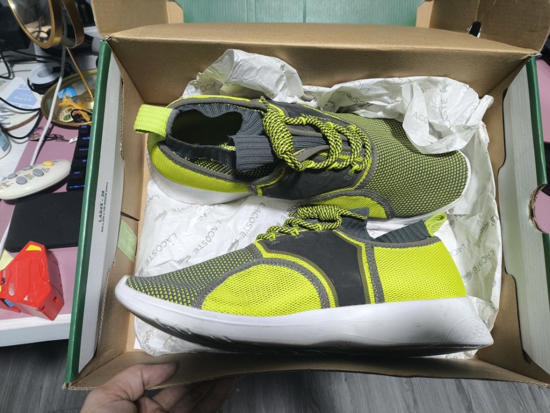 Lacoste LT Sense 220 SMA Sneakers (Category: Casual Shoes) located in San Fernando. Submitted by kai00816 (Listing ID 1439325167, Image 1). Description: - Lacoste LT Sense 220 SMA sneakers - Color: Grey and Yellow - Size: EUR 44.5, US 11, UK 10 - Material: Textile and Synthetic - Comes with original box - Condition: Soles show wear.