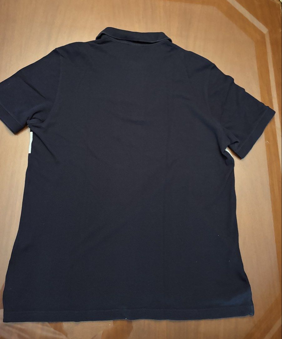 Lacoste Striped Polo Shirt (Category: Tshirts & Polo Shirts ) located in Manila. Submitted by senior.declutter (Listing ID 1439260612, Image 3). Description: - Authentic Lacoste polo shirt - Striped design (navy blue, white, mint green) - Size 6 - Made in Peru - 100% cotton - Features the Lacoste crocodile logo - Dimensions: chest circumference 42” shoulder 19” length 29” RFS: decluttering .