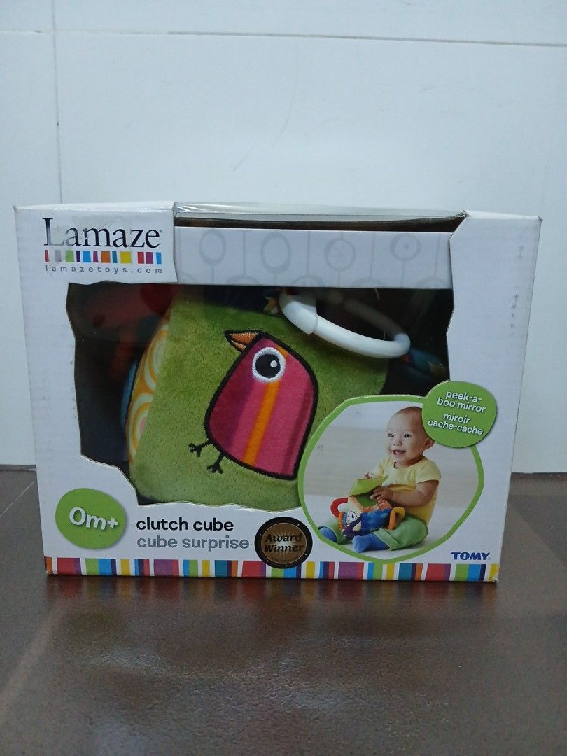 Pristine Condition Lamaze Clutch Cube Cube Surprise Toy (Category: Infant Playtime) located in Quezon City. Submitted by ninetieskid4ever (Listing ID 1439419433, Image 1). Description: With original box. Pristine condition..