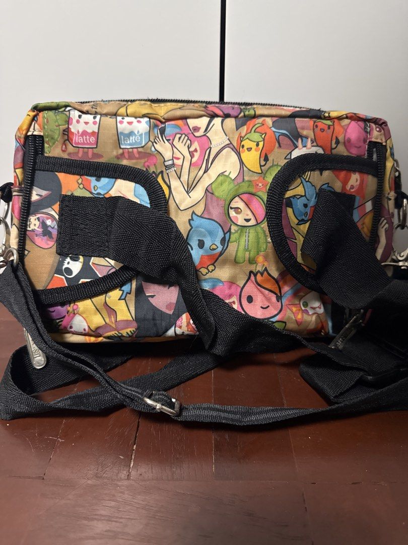 LeSportsac Crossbody Bag (Category: Cross-body Bags) located in Manila. Submitted by matet_s (Listing ID 1439388204, Image 3). Description: - LeSportsac crossbody bag - Colorful print - Multiple compartments - Adjustable black strap - LeSportsac logo on front.
