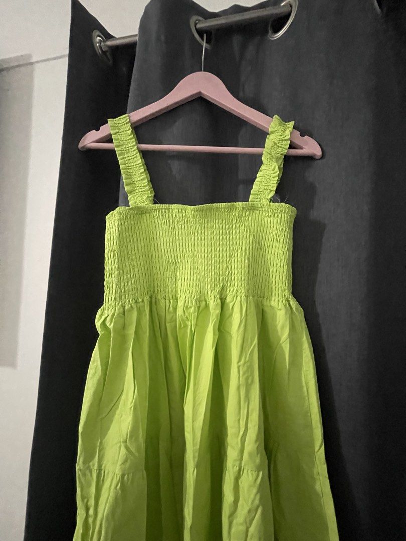 Lime Green Smocked Dress (Category: Dresses) located in Mabalacat. Submitted by thriftstorelikenew (Listing ID 1439382352, Image 1). Description: - Lime green midi dress - Smocked bodice - Tiered skirt - Wide straps - Solid color - Ideal for casual outings - Size tag included Size M-L.