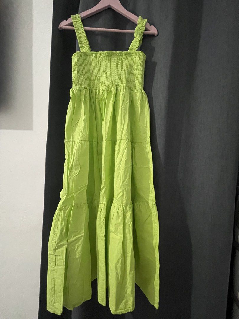 Lime Green Smocked Dress (Category: Dresses) located in Mabalacat. Submitted by thriftstorelikenew (Listing ID 1439382352, Image 2). Description: - Lime green midi dress - Smocked bodice - Tiered skirt - Wide straps - Solid color - Ideal for casual outings - Size tag included Size M-L.