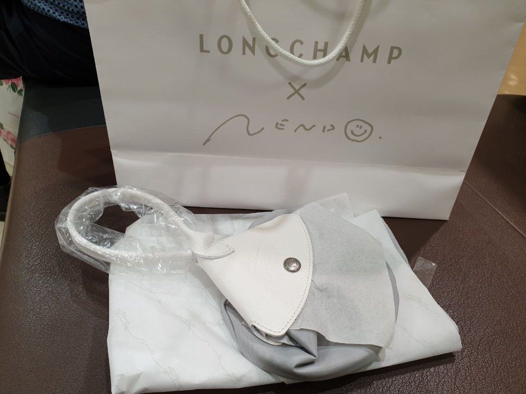 Longchamp x Nendo Pouch (Category: Luxury Bags & Wallets) located in Quezon City. Submitted by ejay75 (Listing ID 1439252271, Image 1). Description: Authentic Longchamp x Nendo. Good as Brandnew. .