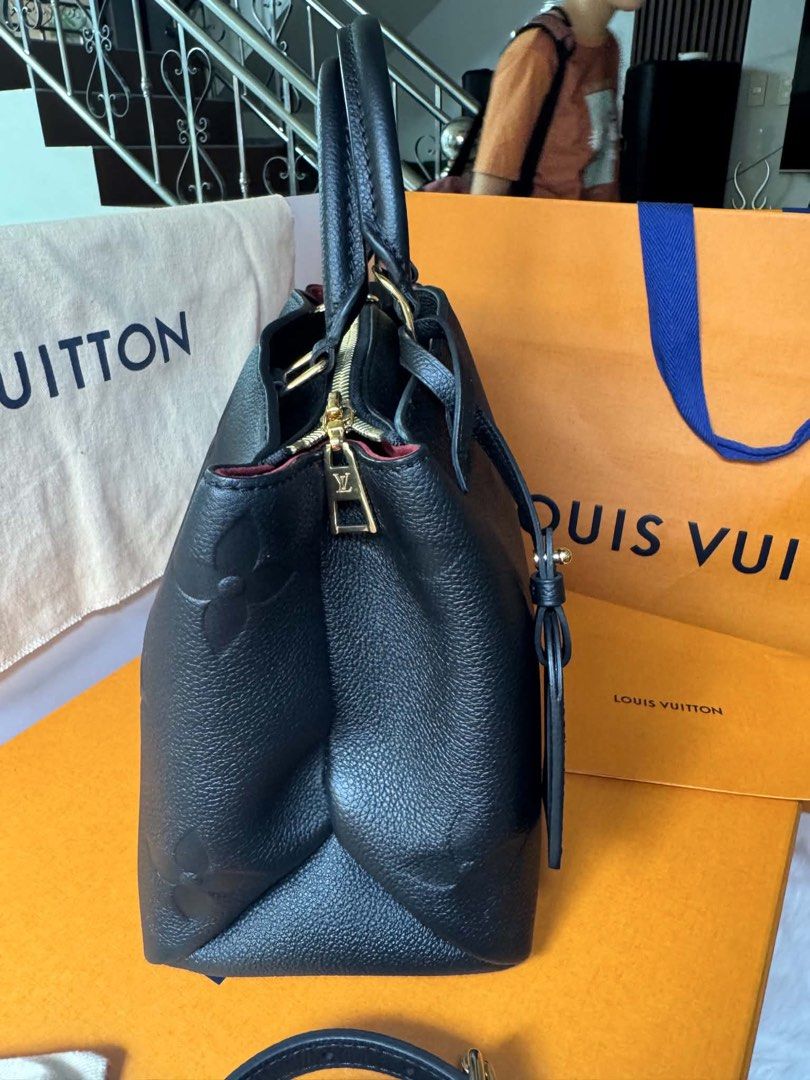 Louis Vuitton Coussin PM Black (Category: Luxury Bags & Wallets) located in Malabon City. Submitted by cosmicwhale_4f8f76 (Listing ID 1439274259, Image 2). Description: - Authentic Louis Vuitton Coussin PM handbag - Color: Black - Features a top handle and detachable shoulder strap - Secure zip closure - Interior: Red - Includes: Dust bag, small pouch, and box - Exterior: Iconic Louis Vuitton embossed pattern. Louis Vuitton Petit Palais PM (M5891