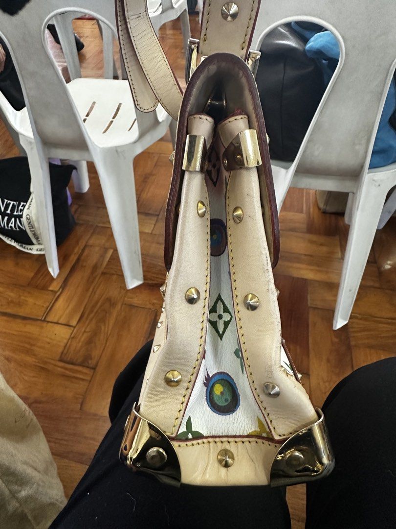 Louis Vuitton Multicolor White Handbag (Category: Luxury Bags & Wallets) located in Manila. Submitted by everythingsale101 (Listing ID 1439256649, Image 3). Description: - Louis Vuitton handbag NGA hence selling super low - White multicolor - Bow closure with gold padlock - Top handle and shoulder strap - Gold studs and corner protectors - Takashi Murakami Eye Miss You Limited Edition.