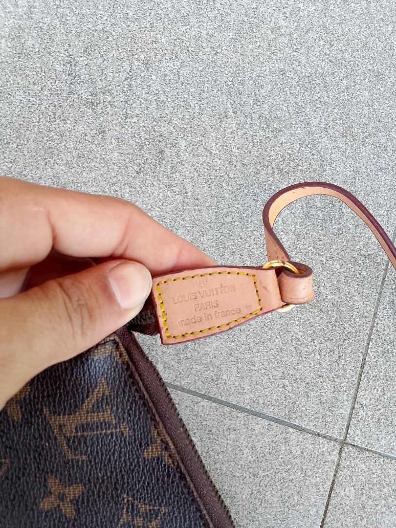 Louis Vuitton Pochette Accessories (Category: Luxury Bags & Wallets) located in Iloilo. Submitted by janillthrifted (Listing ID 1439387104, Image 2). Description: - Authentic Louis Vuitton Pochette Accessories handbag - Iconic LV monogram pattern - Detachable strap included - Gold-tone zipper - Interior leather tag with Louis Vuitton logo and "Made in France" inscription.