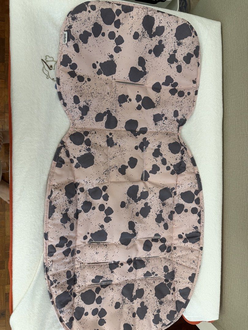 Mamas & Papas Stroller Seat Liner and Headrest (Category: Strollers) located in Manila. Submitted by rjsv12345 (Listing ID 1439317135, Image 2). Description: - Mamas & Papas stroller seat liner and headrest included. - Seat liner features a stylish pink and gray splatter pattern. - Headrest in a neutral gray color. - Made from 100% polyester. - Manufactured in China..