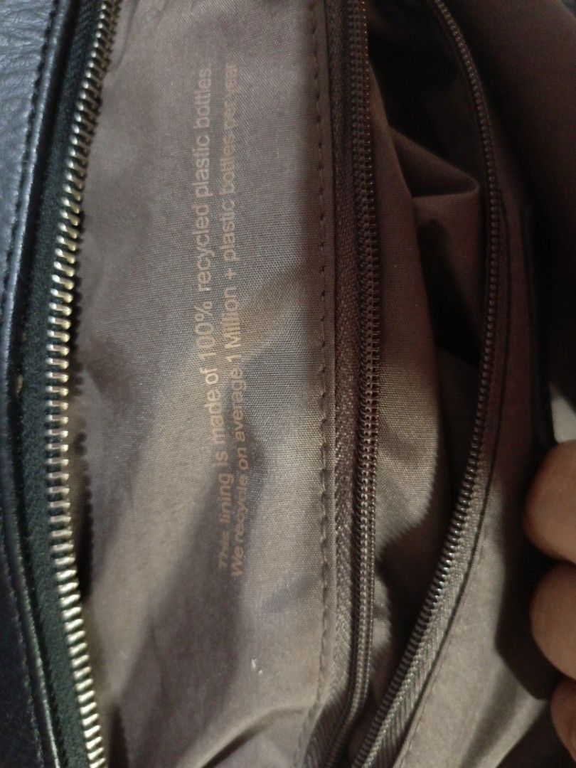 Matt & Nat Two Way bag (Category: Luxury Bags & Wallets) located in San Jose del Monte. Submitted by m_nshop (Listing ID 1439335988, Image 3). Description: - Matt & Nat black handbag - Top handle and detachable shoulder strap - Interior made from recycled plastic bottles - Zippered main compartment - Additional interior pocket - Silver-toned hardware - Textured exterior material PRELOVED FROM JAPAN AUCTION NO COD PAYMENT FIRST LALAMOVE OR JNT COU