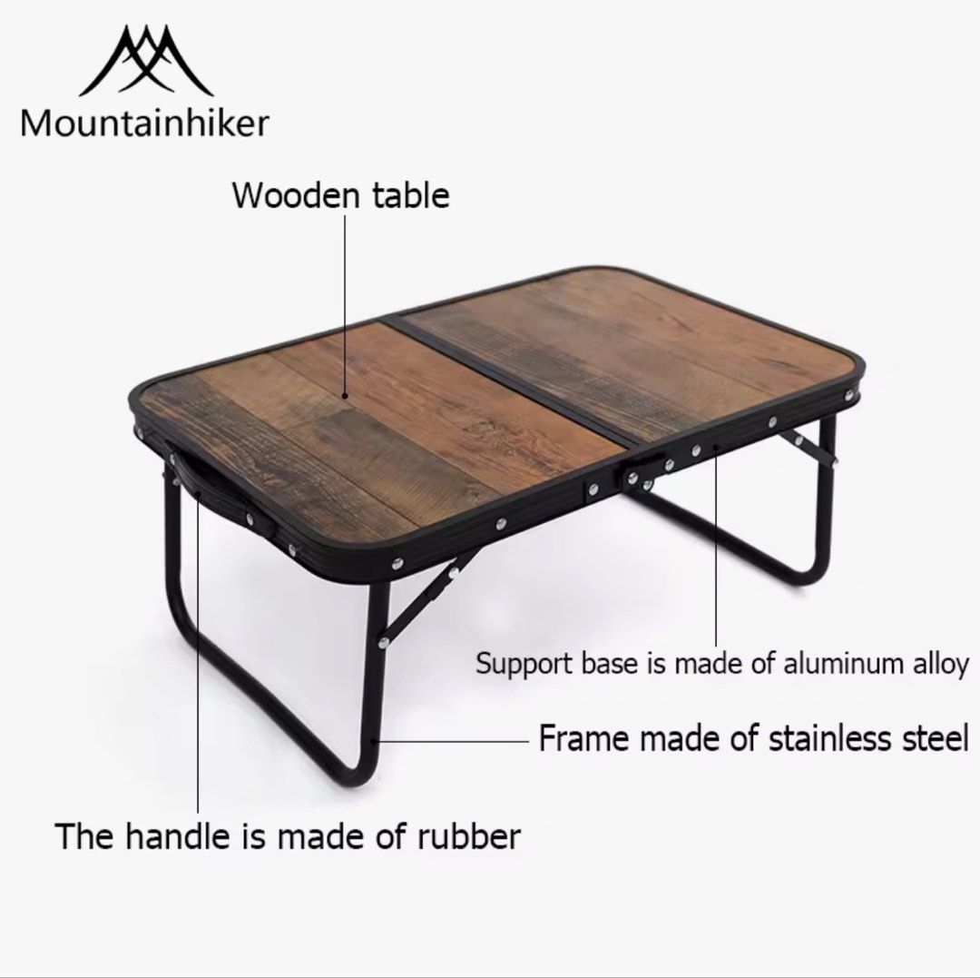 MOUNTAINHIKER Folding Wooden Table (Category: Tables & Sets) located in Quezon City. Submitted by immarxc (Listing ID 1439350971, Image 1). Description: - Mountainhiker folding table for outdoor activities. - Features a durable wooden tabletop. - Comfortable rubber handle for carrying. - Sturdy support base made of aluminum alloy. - Strong and rust-resistant stainless steel frame. - Folds up compactly for easy storage and transport. - Ideal for c