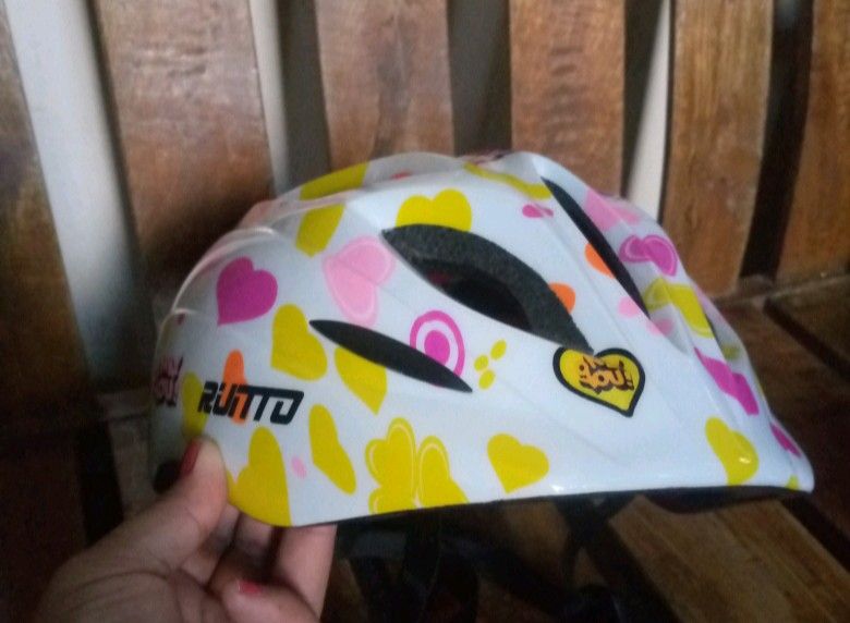 Multicolor Bike Helmet for Kids (Category: Other Sports Equipment and Supplies) located in San Mateo. Submitted by winadeals (Listing ID 1439281471, Image 1). Description: This bike helmet features a vibrant, multi-colored heart pattern over a white background with great comfort, durability and safety functions. Give your kids a safe biking experience and avail this beautifully-designed bike helmet now. Just click the offer and purchase transacti